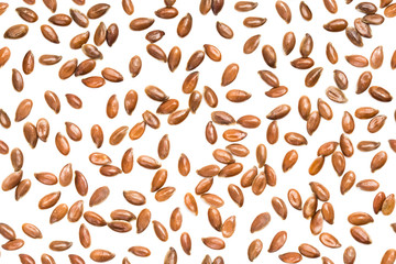 Seamless background with linseed or flax seeds spread out on white