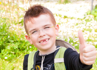 Smiling child with missing front teeth