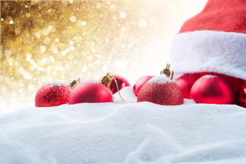 Fototapeta na wymiar Christmas balls decorations on snow