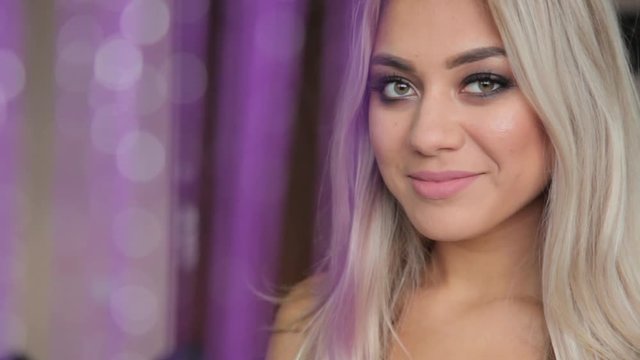 beautiful young happy girl with makeup