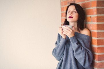  woman with of coffee or tea