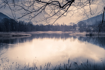 lake and mountain in a rainy day