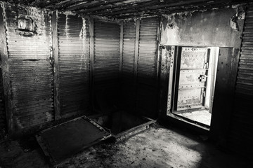 Abstract dark grungy interior, black and white