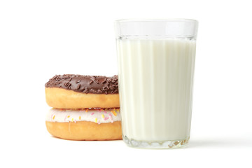 Glass of milk and donuts