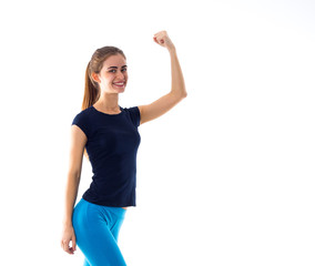 Obraz na płótnie Canvas Smiling woman showing biceps