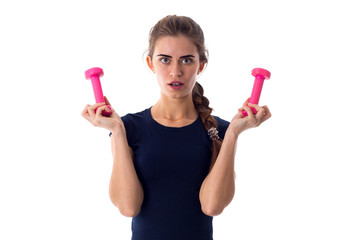 Woman holding two dumbbells