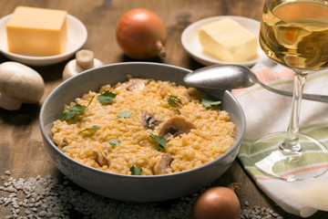Risotto with mushrooms, fresh herbs and parmesan cheese