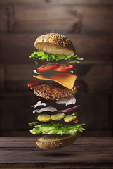 Burger preparation ingredients - obrazy, fototapety, plakaty