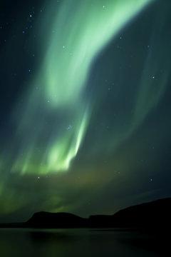Aurora Borealis beautiful northern light in the clear night sky,  Iceland