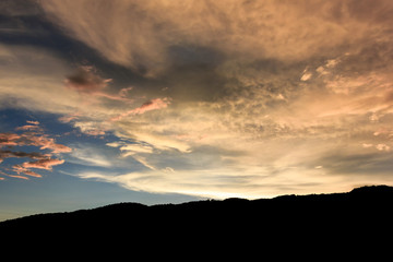 orenge sky and siluate mountain at evening