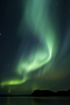 Aurora Borealis beautiful northern light in the clear night sky,  Iceland