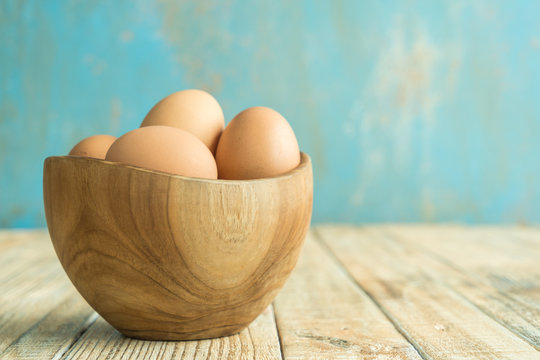 Chicken Egg on the wood old background