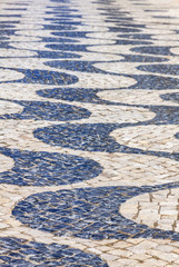 Patterned paving tiles in Lisbon city, Portugal