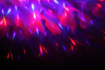 abstract lights nightclub dance party  background in purple violet and red hologram prism 