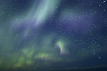 Fototapeta na wymiar Aurora Borealis beautiful northern light in the clear night sky, Iceland