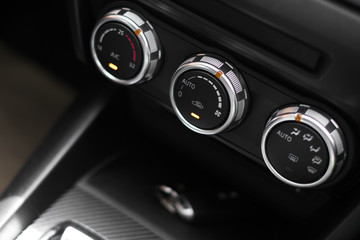 Interior of a modern car, Car Air Conditioner buttons.
