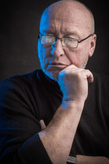 serious man with glasses