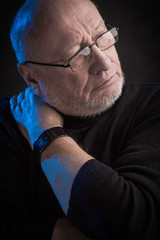 serious man with glasses