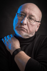 serious man with glasses