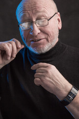 serious man with glasses