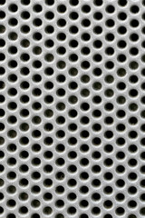 hole on silver metal surface.