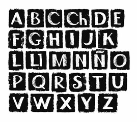 Spanish alphabet, in capital white letters on a black background. Vector, white letters on black rectangles. The texture of chalk on the black soot, simulation.  