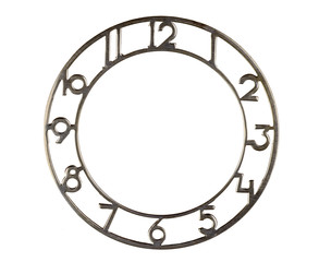 The dial of the clock on white