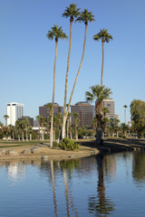 Phoenix downtown as seen from Encanto Park Lake, AZ