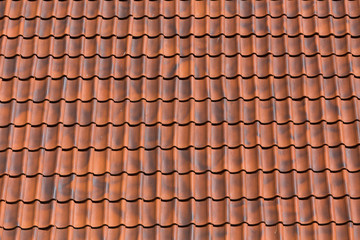 Red tiles roof background