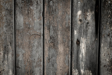 wooden background with weathered wood and ruusty nails