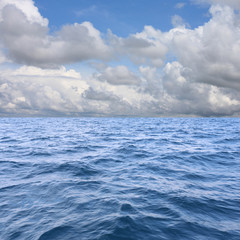 Sea wave and blue sky background.