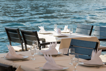 Served table in a restaurant on a sea