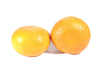 Two ripe oranges isolated on white background, close-up 