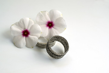 Engraved Metal Cup with Wedding Rings
Wedding Rings and engraved metal cup
