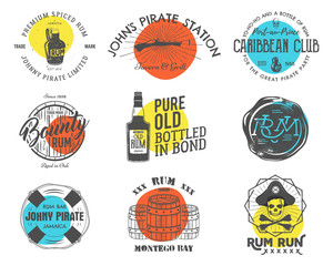 Set of vintage handcrafted emblems, labels, logos. Isolated on a color shapes. Sketching filled style. Pirate and sea symbols - old rum bottles, barrels, skull, pistol. Vector