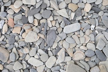Texture of small stones and pebbles on Quebec beach