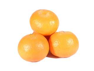 Close up of the pile of ripe oranges isolated on white background 