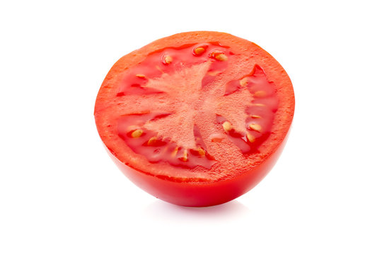 Half of ripe tomatoe on white