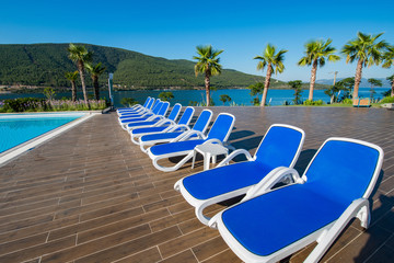 Nice swimming pool outdoors on bright summer day