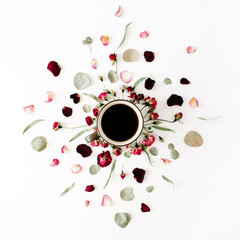 black coffee mug and red rose buds bouquet with eucalyptus on white background. flat lay, top view