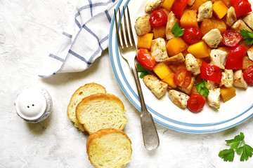 Roasted vegetables with chicken.Top view.