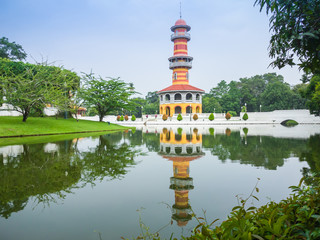 Fototapeta premium Withun Thasana tower is a three storeys building having a spirit staircase leading to the top floor hall located in Bang Pa-In palace (old palace of King Rama V) in Ayutthaya province in Thailand.