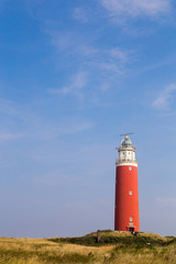 Lighthouse on Texel, Netherlands. - obrazy, fototapety, plakaty