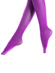 Woman slim legs and violet stockings isolated
