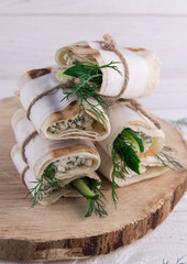 Tortilla wraps with cottage cheese, dill and cucumber