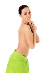 Naklejka premium Young beautiful woman after bath full portrait isolated over white.