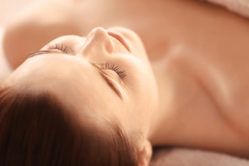 Beautiful girl in spa salon
