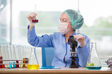 Woman chemist working in the lab