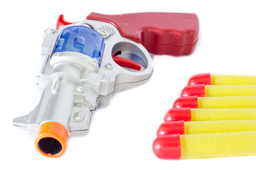 Toy gun isolated on white background.