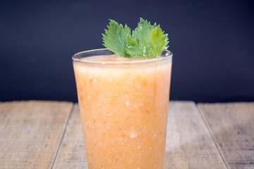 Fresh lemonade with green leaves